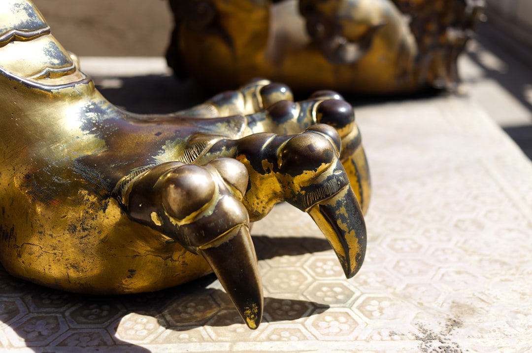 A close up of a statue of a bird