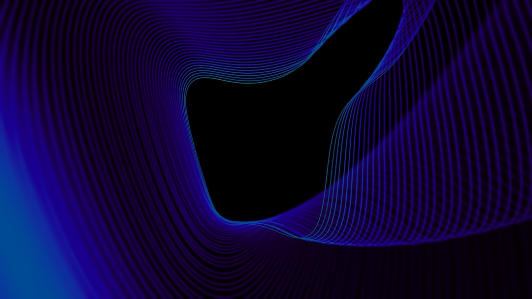 a blue and black background with wavy lines